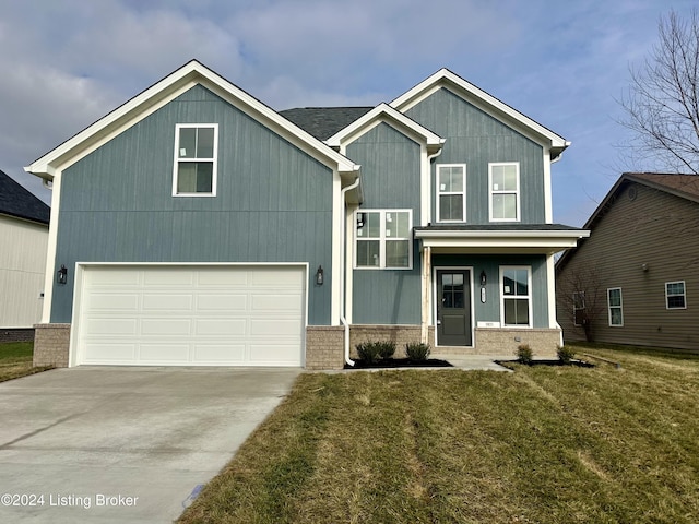 view of front of home featuring a garage and a front yard