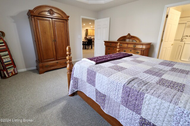 bedroom with light colored carpet