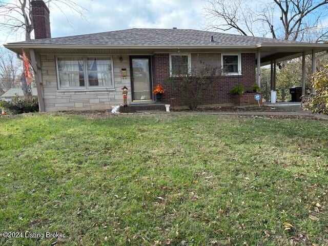 ranch-style house with a front lawn