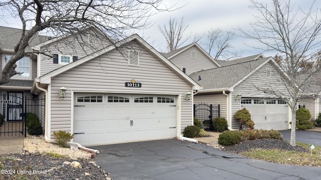 front of property with a garage