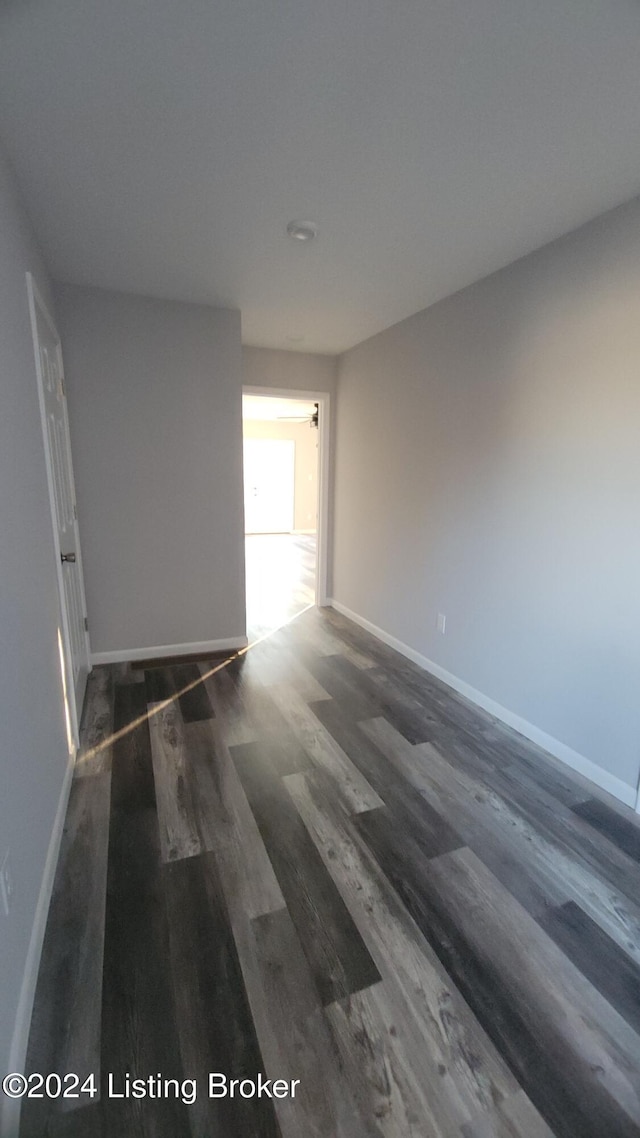 empty room featuring dark hardwood / wood-style floors