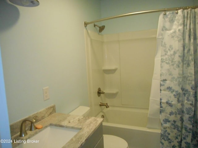 full bathroom with vanity, toilet, and shower / bathtub combination with curtain