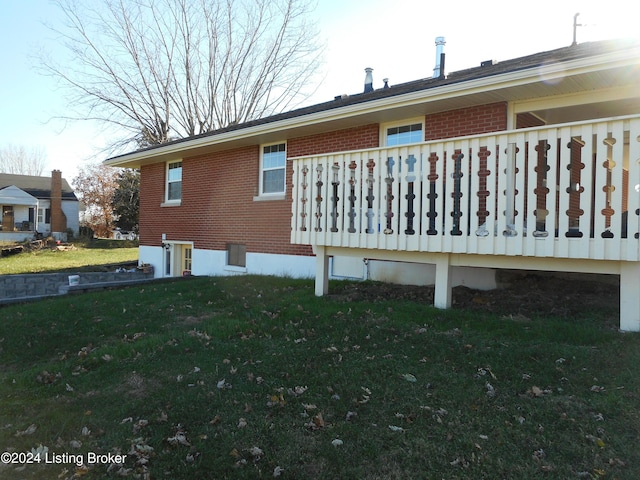 view of home's exterior with a lawn