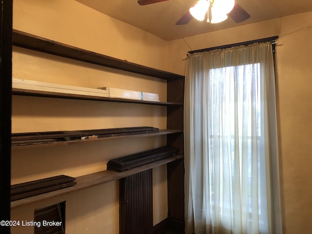 interior space featuring a ceiling fan