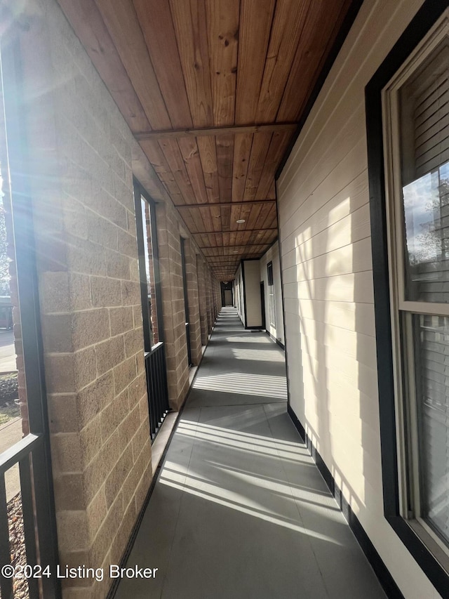 hallway featuring wood ceiling