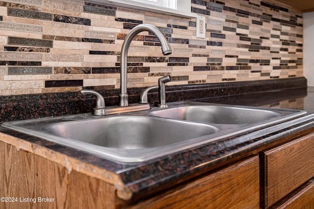 room details with backsplash and sink