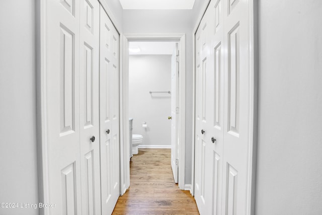 hallway featuring light hardwood / wood-style floors