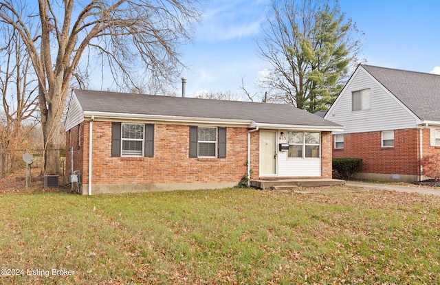 view of front of home with a front lawn