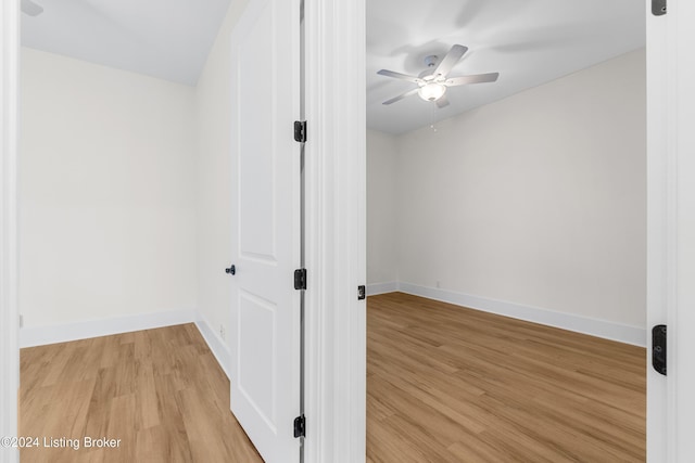 spare room with ceiling fan and light hardwood / wood-style flooring