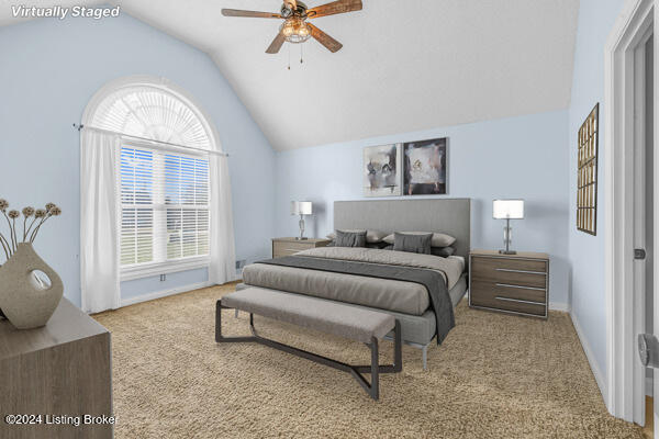 bedroom featuring ceiling fan, light colored carpet, and lofted ceiling