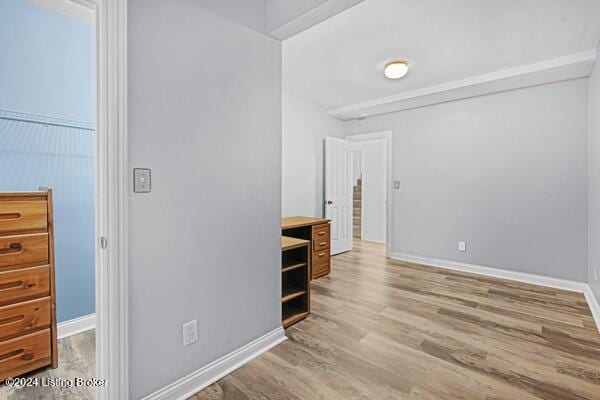 bedroom featuring wood-type flooring