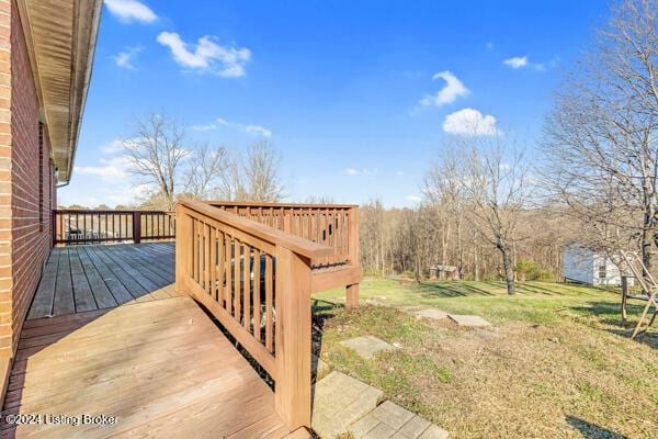 view of yard featuring a wooden deck