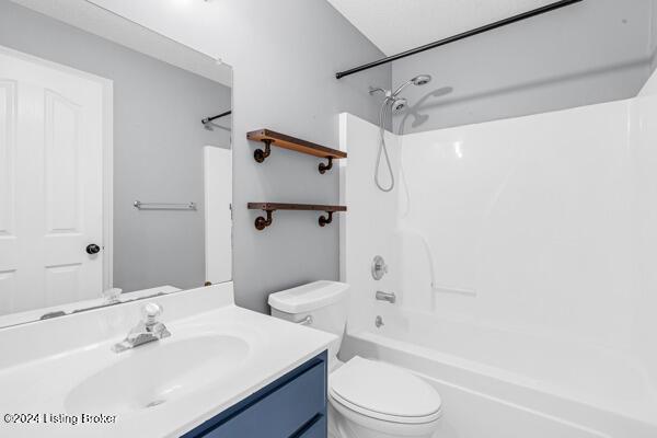 full bathroom with vanity, toilet, and shower / bathtub combination