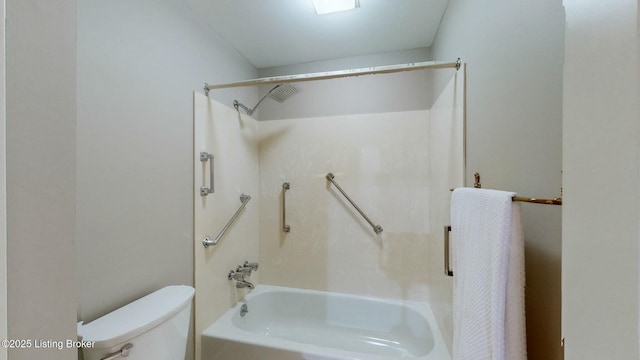 bathroom with toilet and  shower combination