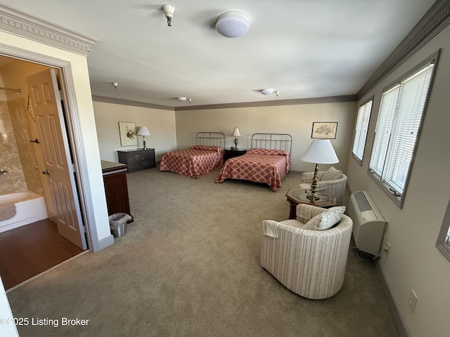 bedroom featuring carpet floors, connected bathroom, and ornamental molding