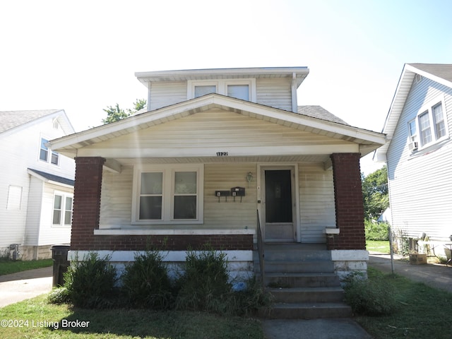 view of front of house with covered porch