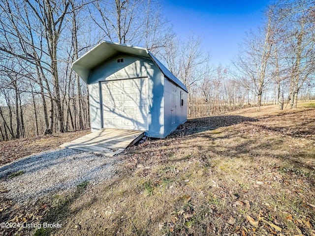 view of outbuilding with a garage