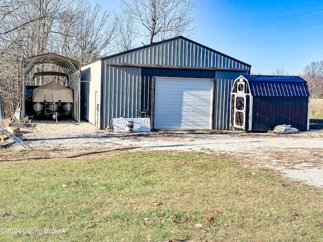 garage with a yard