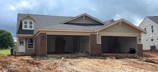 148 Switchgrass Ln Unit 76A, Mt Washington, KY 40047 - view of front of property with a garage and cooling unit