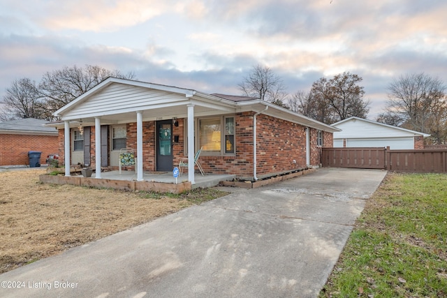 view of front of property with a front lawn and covered porch