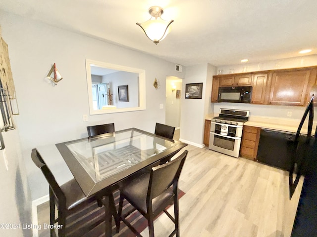 dining room featuring light hardwood / wood-style flooring