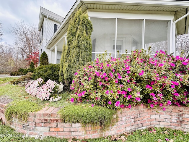 205 W Chestnut St, Leitchfield, KY 42754 - view of side of property featuring a sunroom