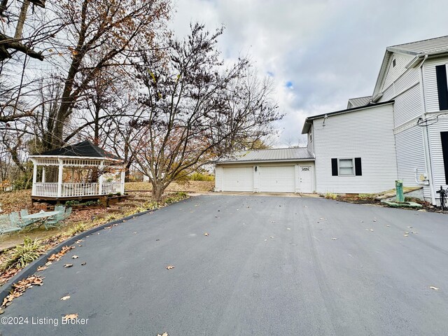 view of side of property featuring a garage