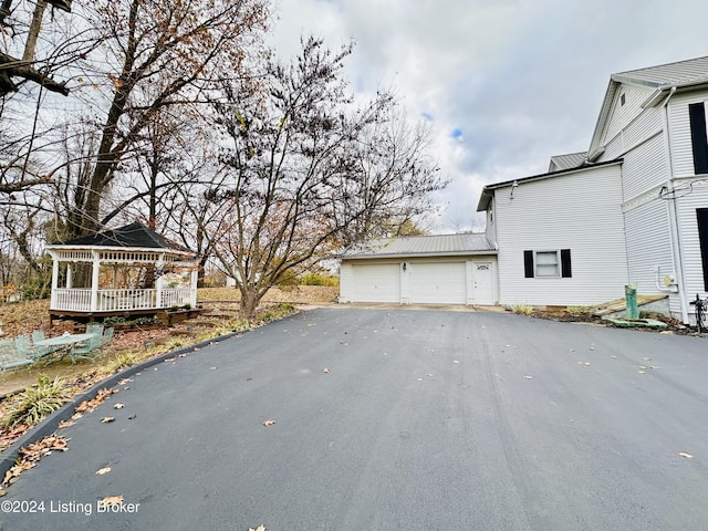 205 W Chestnut St, Leitchfield, KY 42754 - view of asphalt driveway