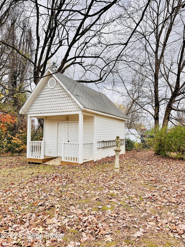 view of property exterior with covered porch