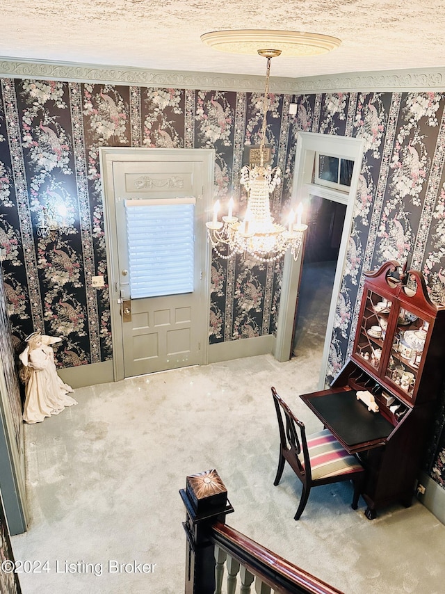 interior space featuring carpet flooring, a textured ceiling, and an inviting chandelier