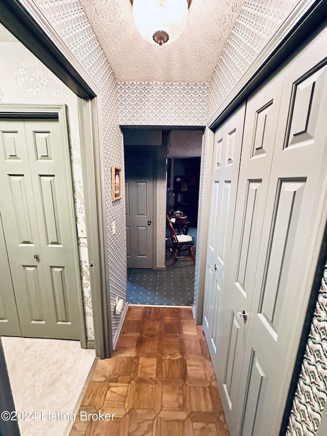 205 W Chestnut St, Leitchfield, KY 42754 - hallway featuring wallpapered walls