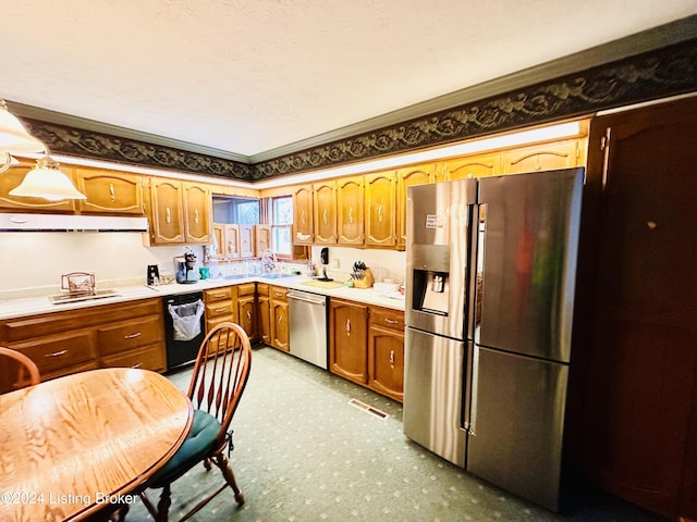 205 W Chestnut St, Leitchfield, KY 42754 - kitchen with appliances with stainless steel finishes, brown cabinets, light countertops, and crown molding