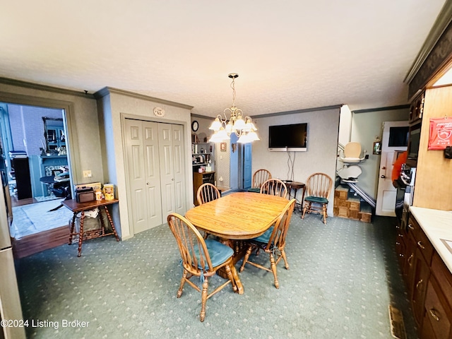 205 W Chestnut St, Leitchfield, KY 42754 - carpeted dining area featuring ornamental molding and a chandelier