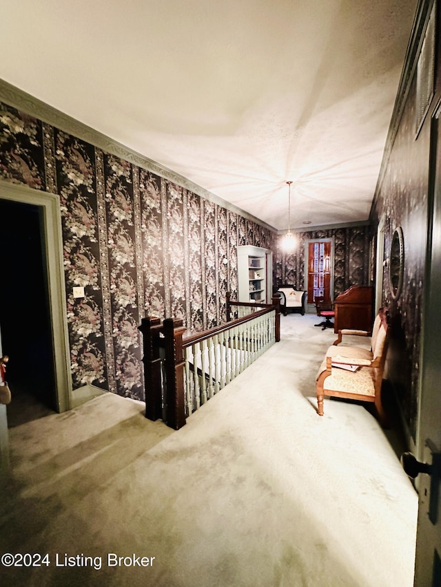 205 W Chestnut St, Leitchfield, KY 42754 - sitting room with carpet, an upstairs landing, wallpapered walls, and a chandelier