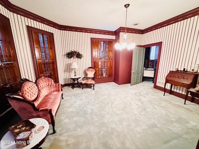 sitting room featuring carpet, a notable chandelier, and crown molding