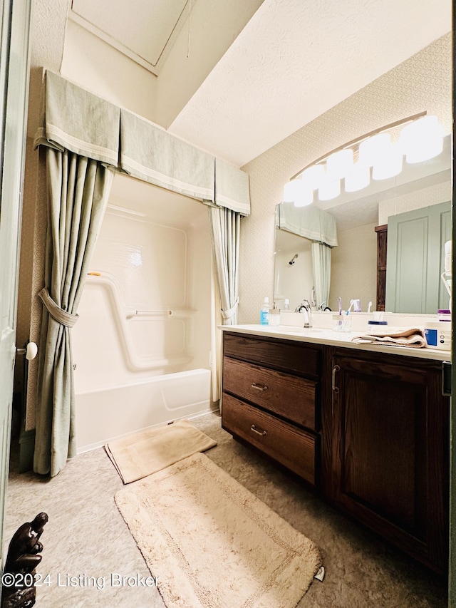 bathroom featuring vanity and shower / tub combo