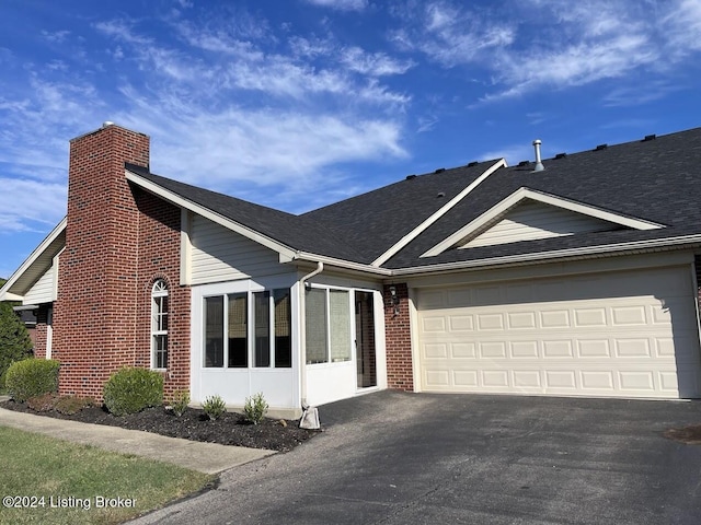 view of front of property featuring a garage