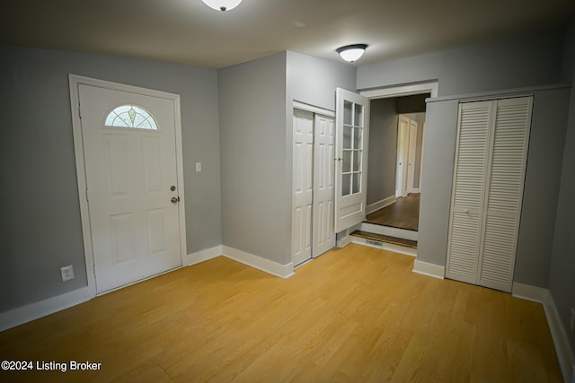 entrance foyer with light wood-type flooring