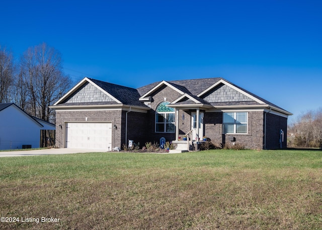 single story home with a garage and a front yard