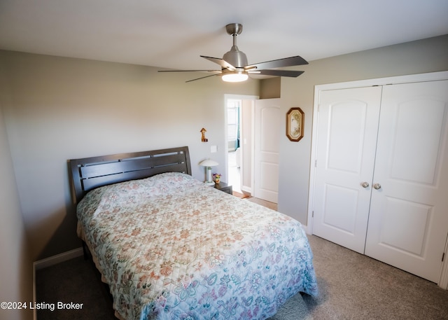 bedroom featuring carpet flooring, ceiling fan, and a closet