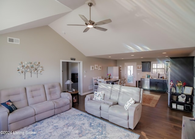 living room with dark hardwood / wood-style flooring, high vaulted ceiling, ceiling fan, and sink