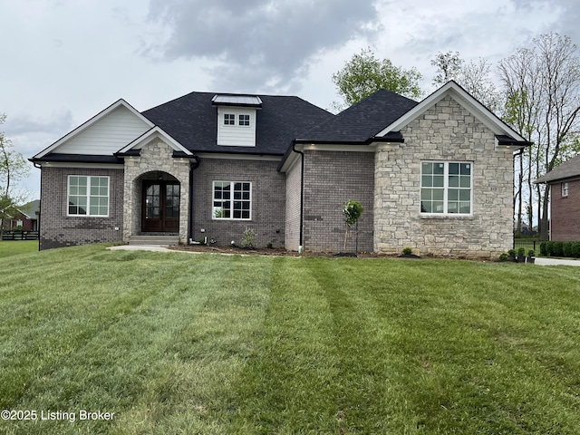 craftsman inspired home featuring stone siding, a shingled roof, and a front yard