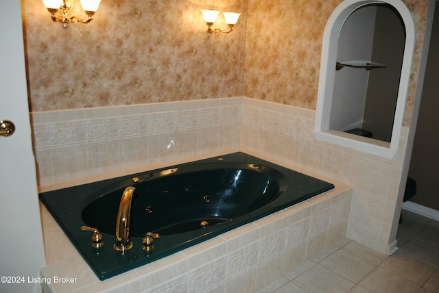 bathroom with tile patterned floors and tiled bath