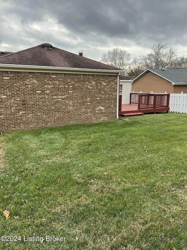 view of yard with a deck