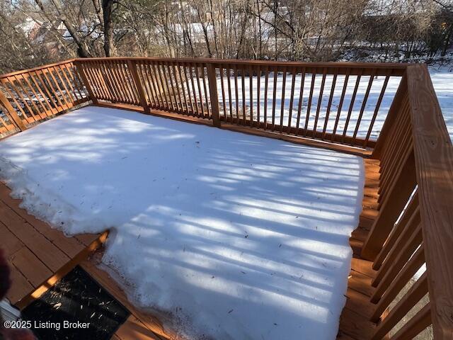 view of snow covered deck