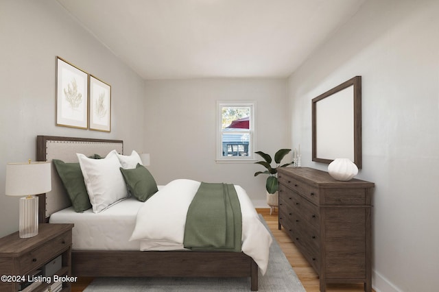 bedroom with light wood-type flooring