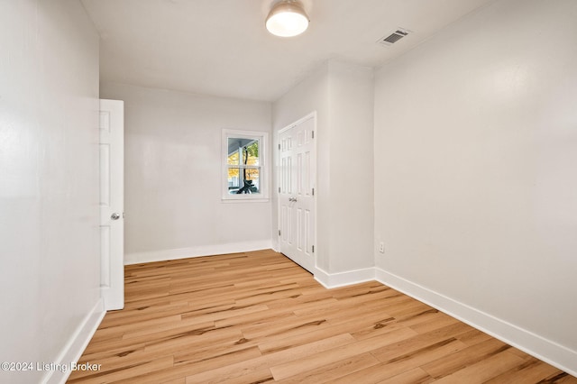 empty room with light wood-type flooring