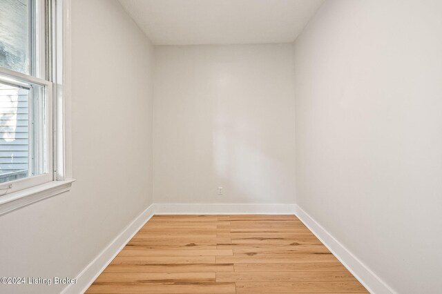 spare room featuring hardwood / wood-style flooring