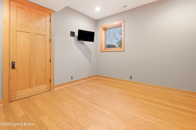 spare room with light wood-type flooring