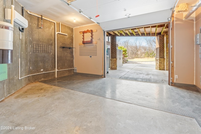 garage featuring a wall unit AC